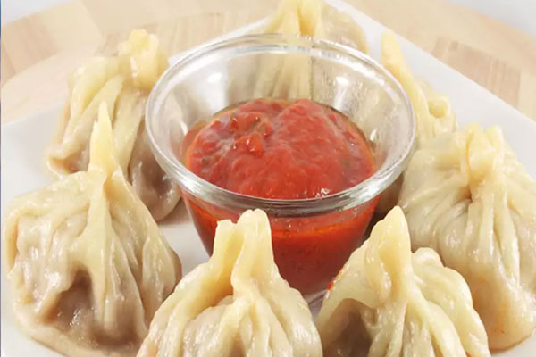 Momos Recipe: घर में बच्चों को बनाकर खिलाएं मोमोज, जानिए क्या है आसान रेसिपी